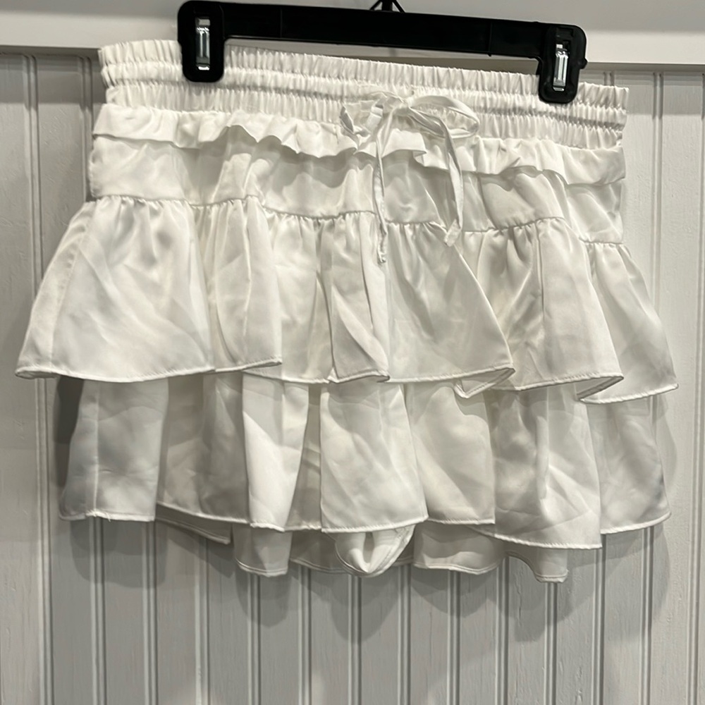White athletic skort with ruffles